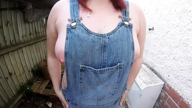 Wife in wellingtons and dungarees in the yard
