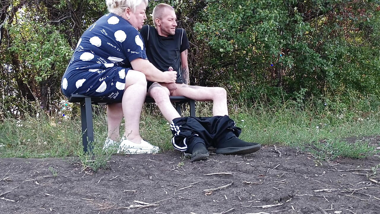 A neighbor in a public park jerks off my dick until I cum