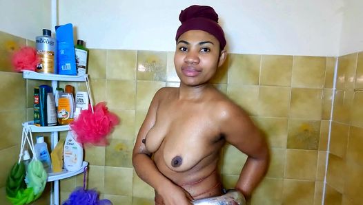 A black girl takes a shower
