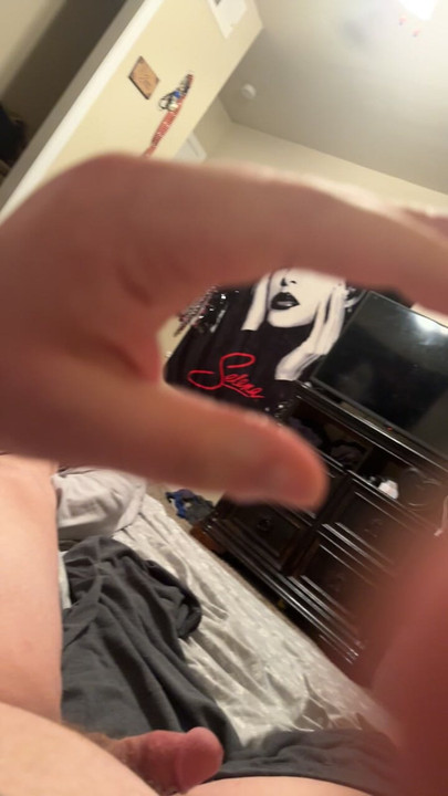 Masturbating
