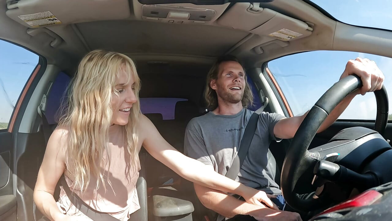 Petite Blonde Gives Her Man Road Head In The Car
