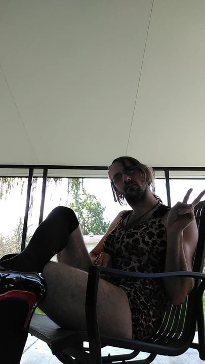 Sissy in leopard dress masturbating outside