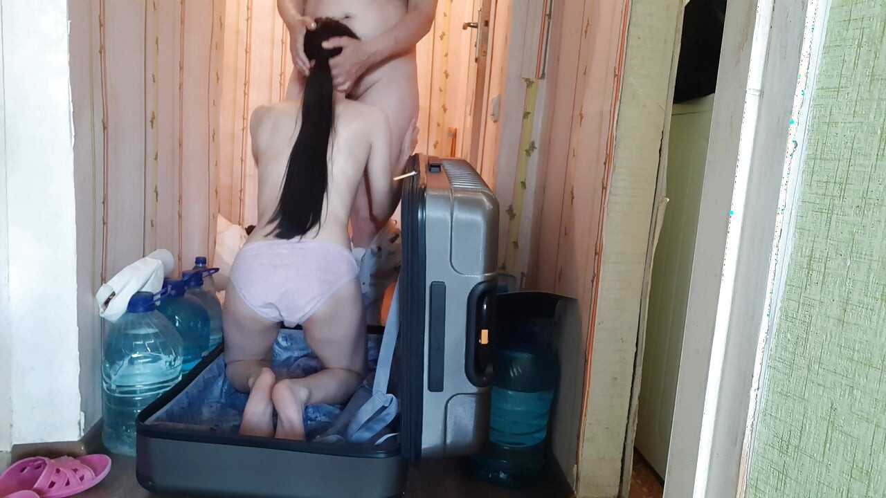 My girlfriend surprised me by coming along on my business trip inside a suitcase