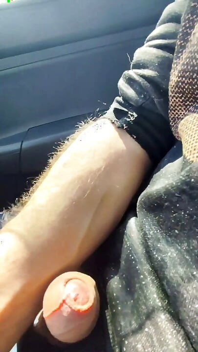 Almost caught! He jerks off in traffic in front of me, I love watching. Big cumshot! Part 1