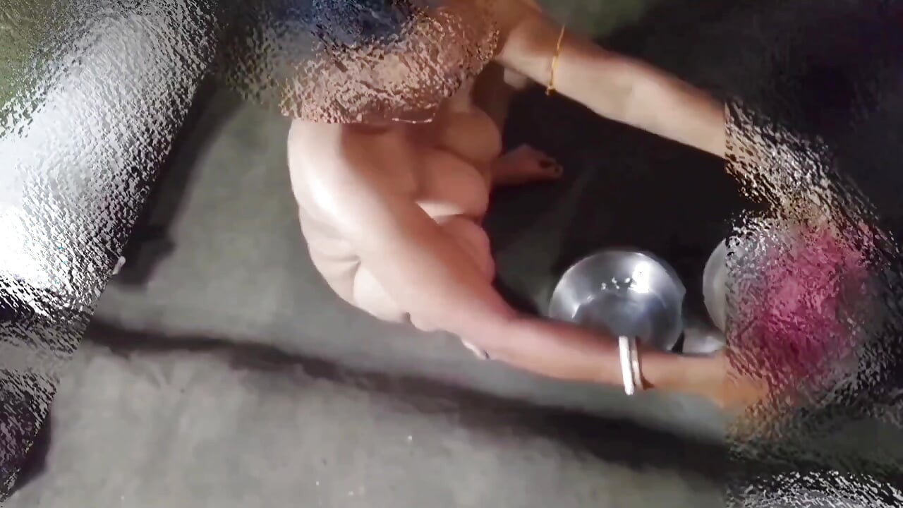 I was cooking naked when my husband came over and started squeezing my breasts.