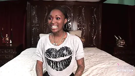 Tattooed ebony freak gets naked