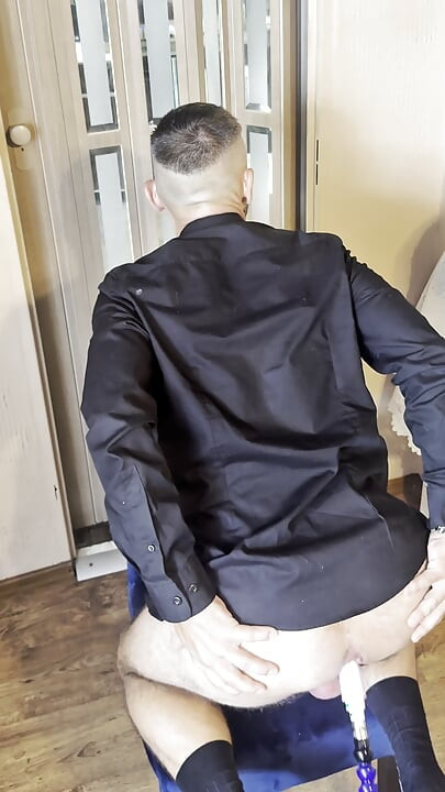Businessman Gets Fucked by a Sex Machine and Cums in a Chastity Cage