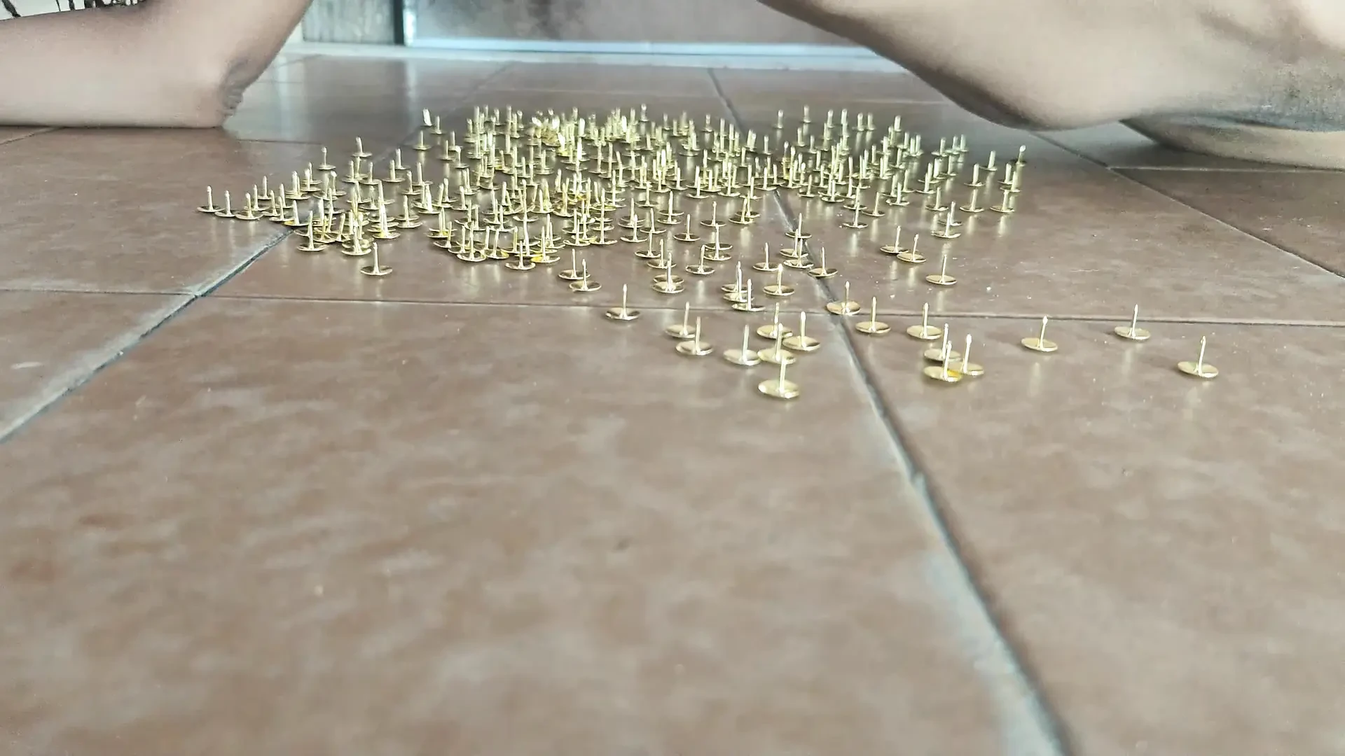 Masochistic Slave Having an Orgasm While Lying on Thumbtacks