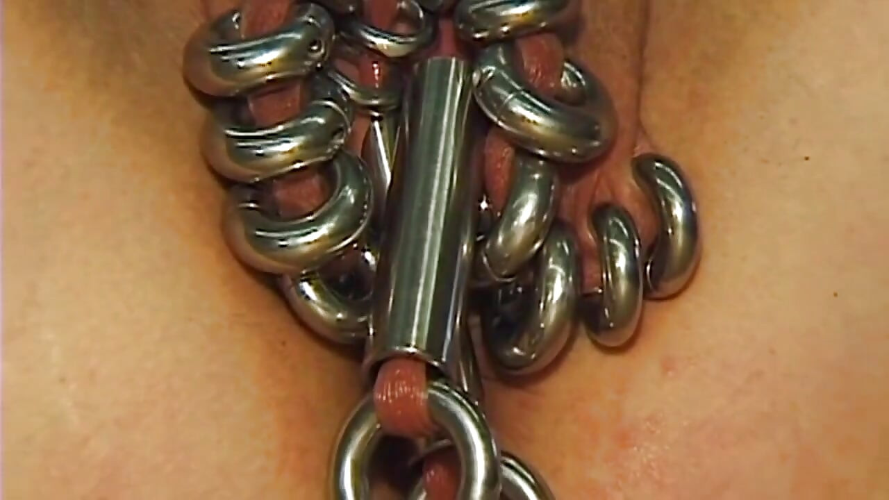Redhead MILF Shows off Her Extreme Piercings