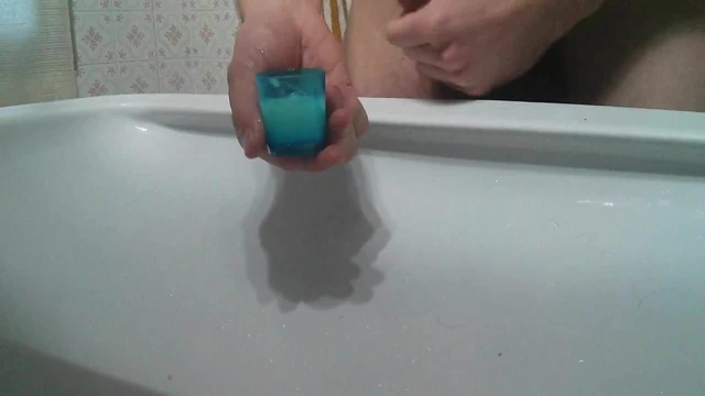 Filling a shotglass with cum 3
