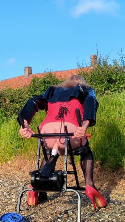 Jaw-dropping moment from "Gina Gets Ass Fucked by Machine Outdoors"