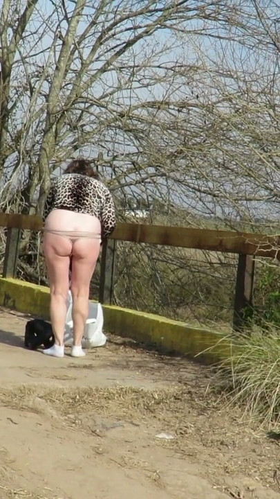 Patricia undresses on the outdoor bridge | Clip 2