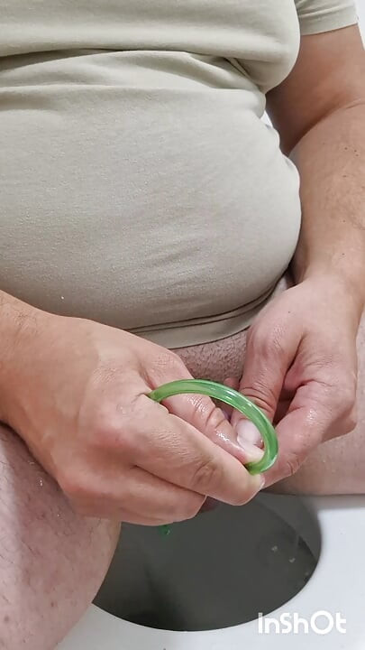Cock stretching with 14mm ball sound and piss drained through silicone hose in peehole