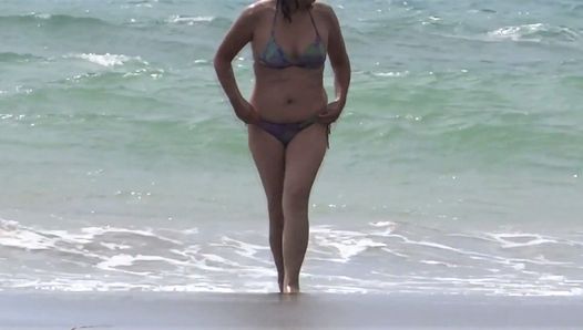 My mature wife shows off and enjoys the beach with her lover