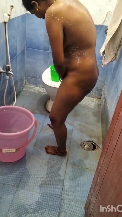 Captivating moment from "Tamil couple bathing doggy fuck"