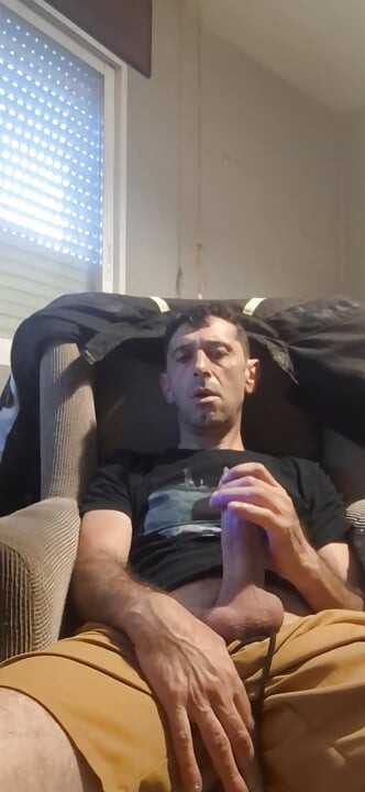Guy masturbating on the sofa