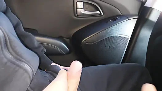 Real amateur stepmom seduces and teases her stepson and gives him a footjob in the car, in public