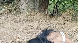 In the woods, on her knees, sucking the cock for her