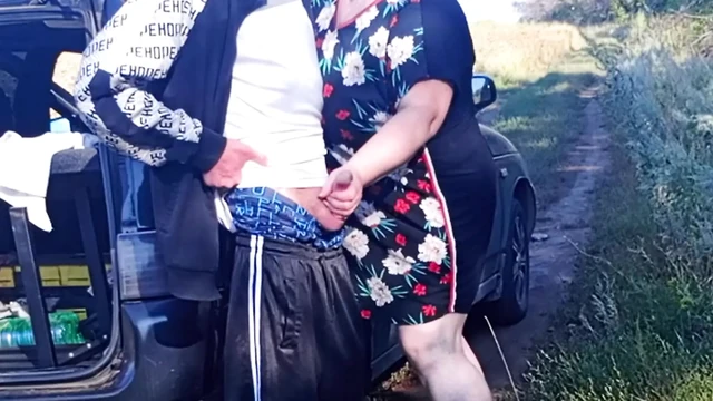 Stepmom holds my dick while I pee and then sucks it in public