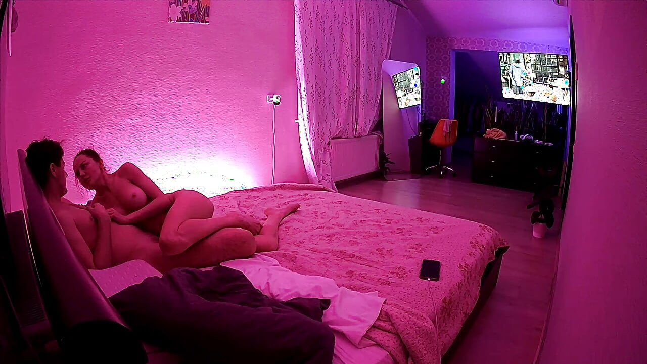 Kamila and Danildo cuddling in bed
