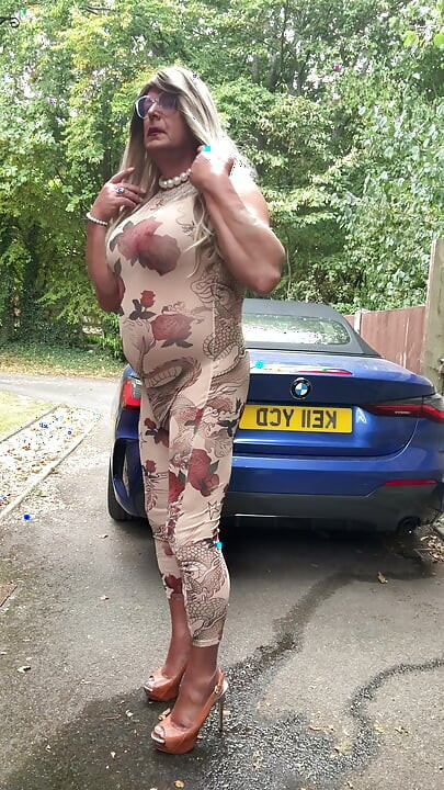 Sexy Crossdresser kellycd2022 in sexy floral see thru catsuit and heels