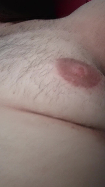 Masturbating