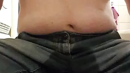 Pee in jeans while sitting