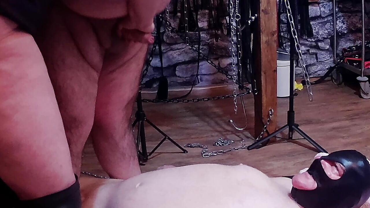 Part 6:- Lanista Bear & Domina Satana takes pussy licker in the dungeon for a bit of food play and treats.