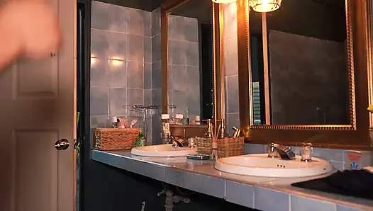 Stepmother catches stepson taking a shower and is surprised by his huge cock