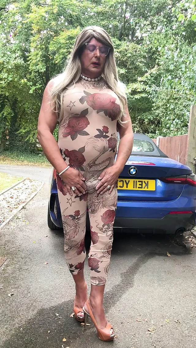 Sexy Crossdresser kellycd2022 in sexy floral see thru catsuit and heels