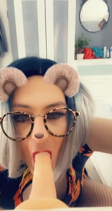 CD sissy sucking on a dildo