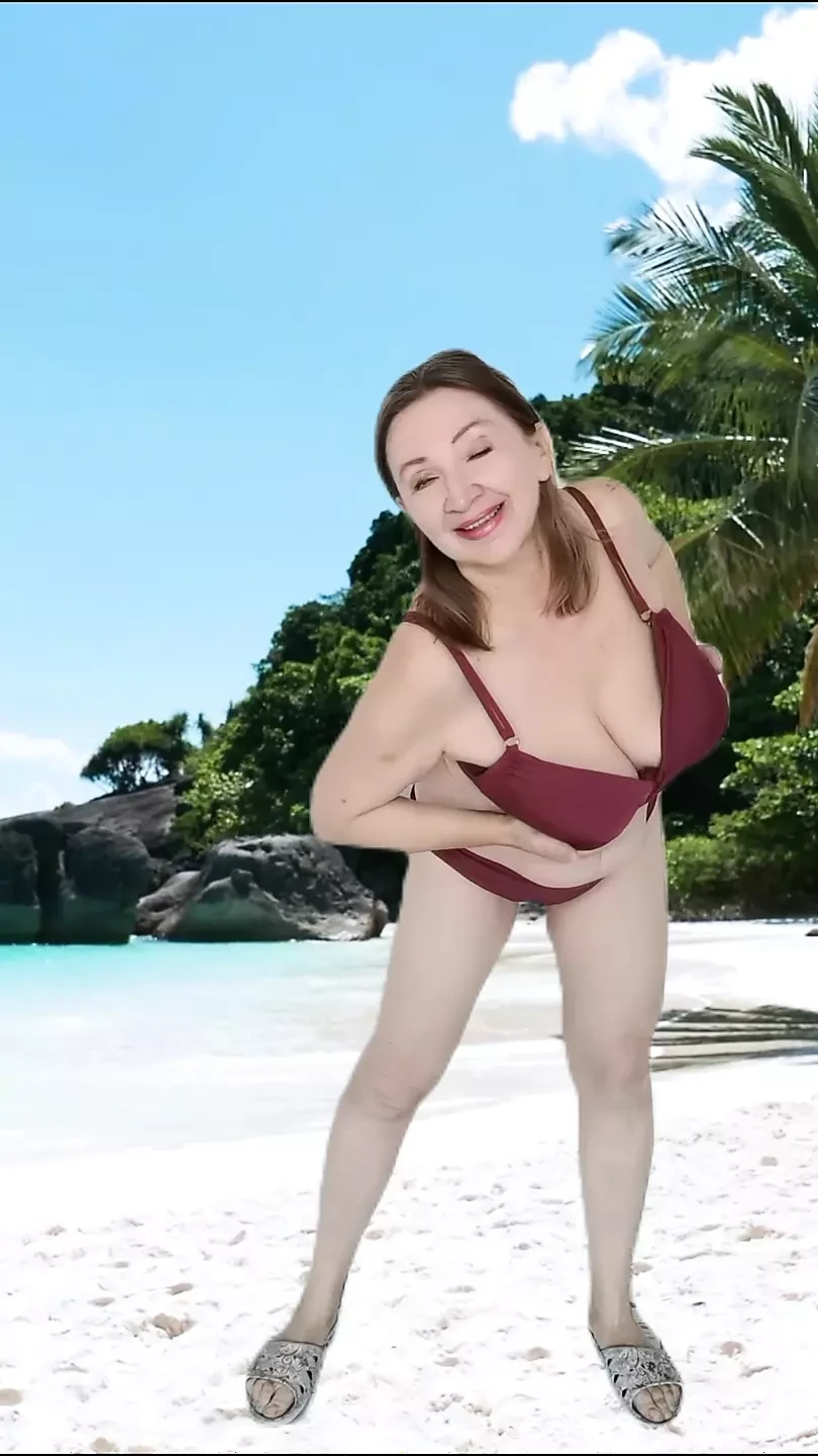 Busty granny shows huge natural tits in bikini, sexy strip