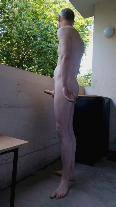 Man outside on balcony stood naked he wanks his erect uncut cock horny for everyone to see his hard wanker penis | Clip 1