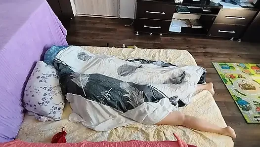 Sensual massage of a hot amateur couple with oil on the body.