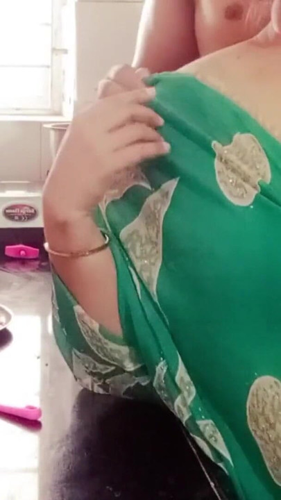 Spectacular moment from "Desi Indian Big Boobs Stepmom Arya Fucked by Stepson in Kitchen while Cooking."