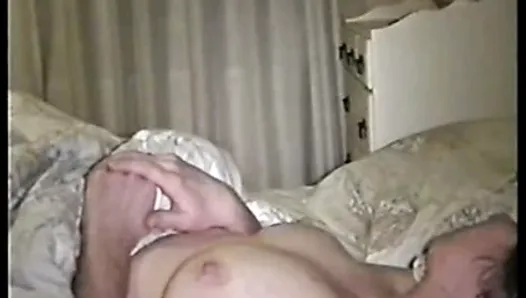 Husband wanks off over her tits