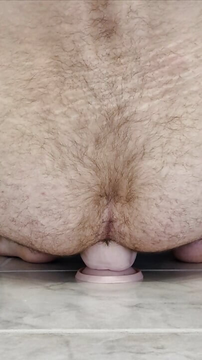 Fucking a thick dildo doggy