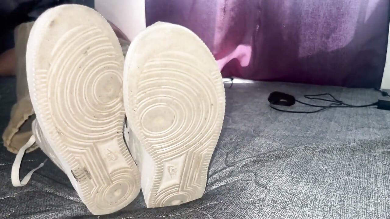 A University Rests Her Feet on Her Face so That the Adorers