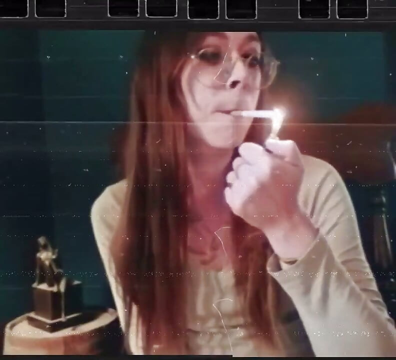 Are you ready for a silent smoking hot Domme looking natural?