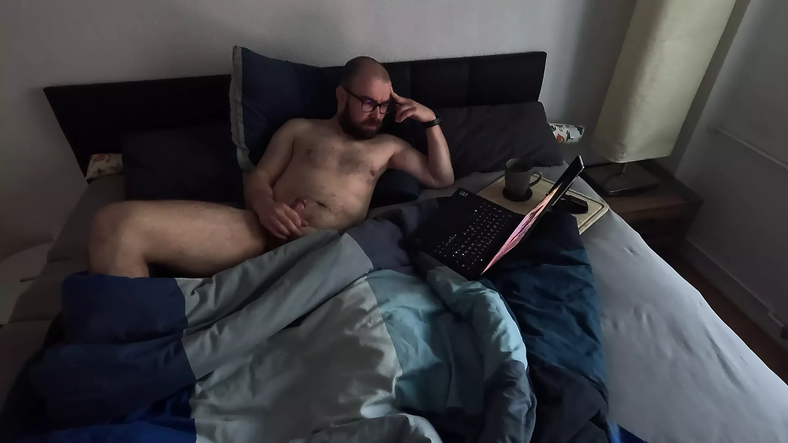 Watching porn in bed