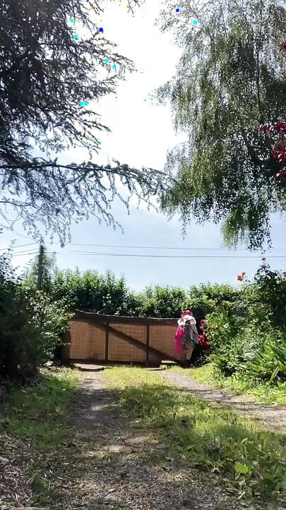 In gardening clothes to go get the mail
