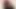 a whore getting fucked in the ass by a dildo