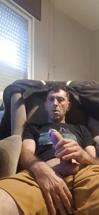 Guy masturbating on the sofa