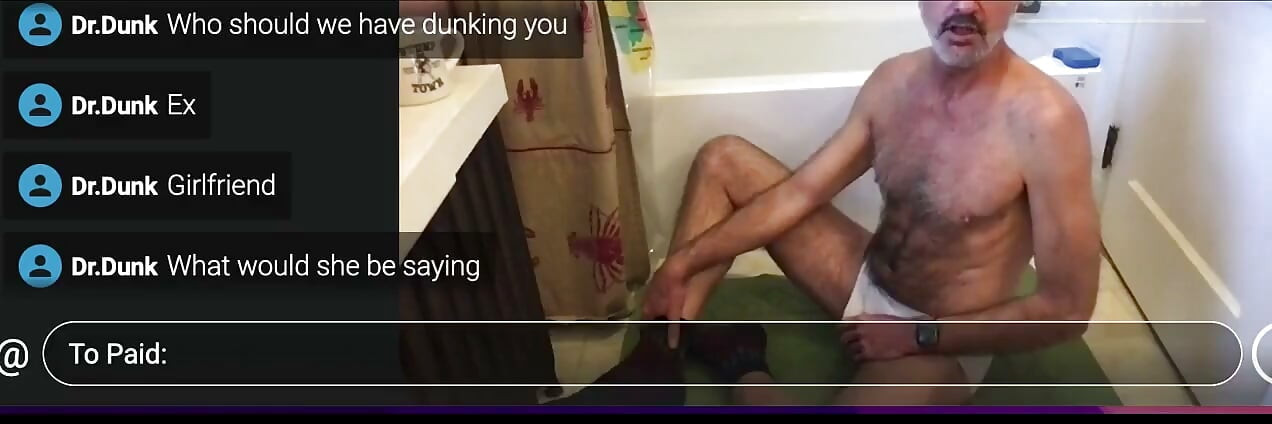 Guy Getting Dunked in a Tub.