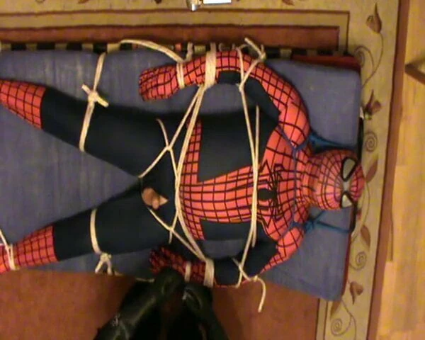 Restrained Spiderman is milked