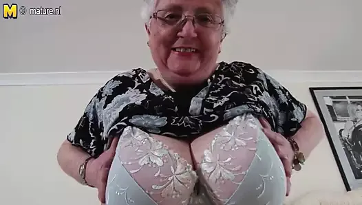 Busty amateur grandmother makes first porn