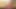 Blonde ladyboy in pink bikini jerks off her small cock on