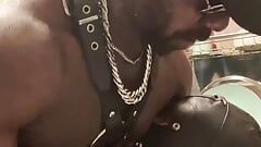 Tit and Dick Focus: Black Muscle Orders Leather Clad Anon Sub to Work