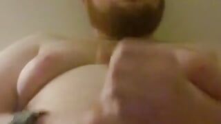 Sexy naked redhead has a huge thick cock
