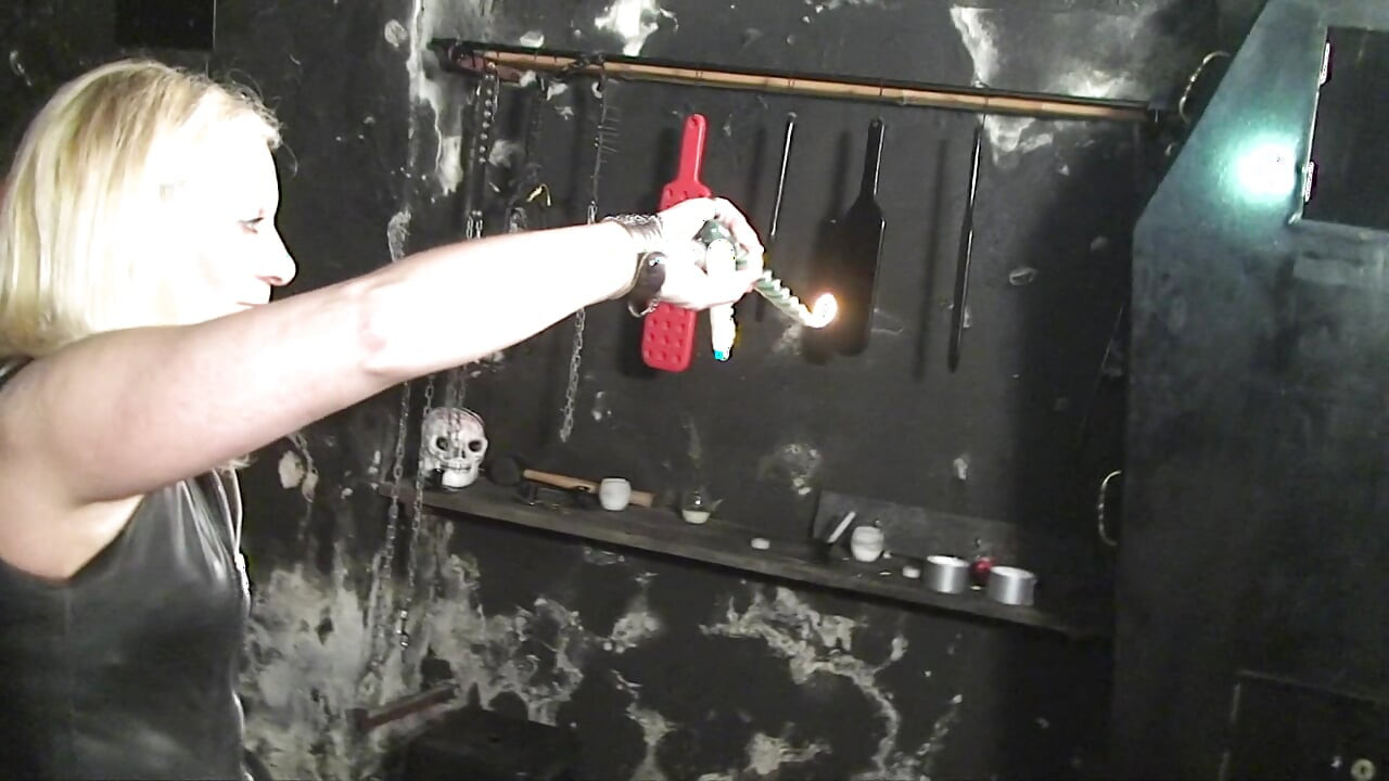 Whipping and wax play for the tape bondaged mature blonde